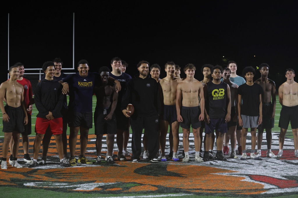 BAT football athletes on the turf