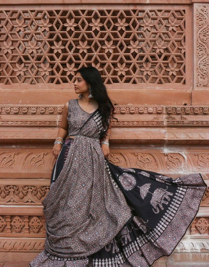 Portrait in traditional dress with ornate architecture
