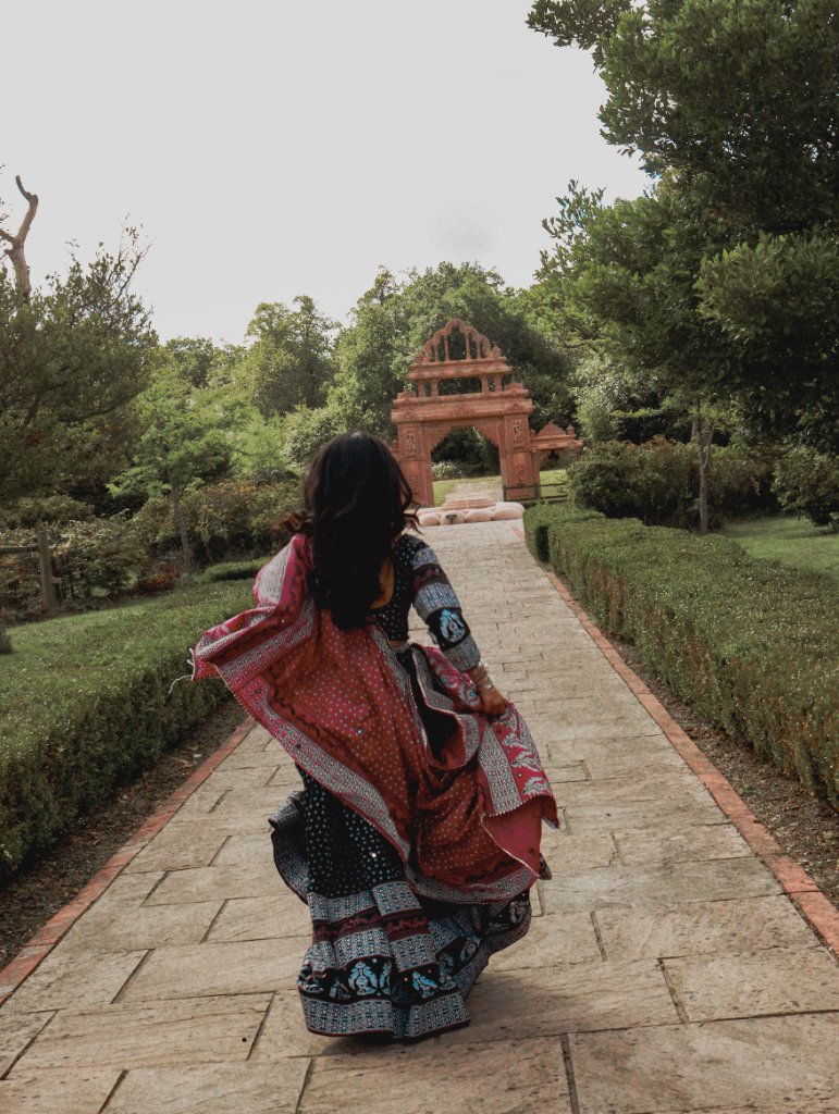 Portrait with flowing fabric in garden setting