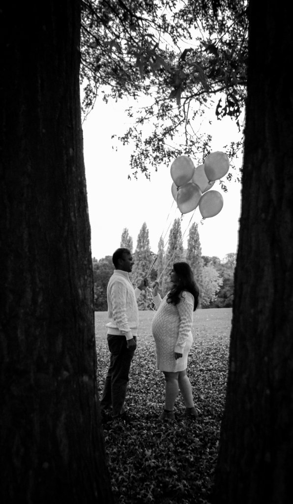 Couple with balloons maternity black and white