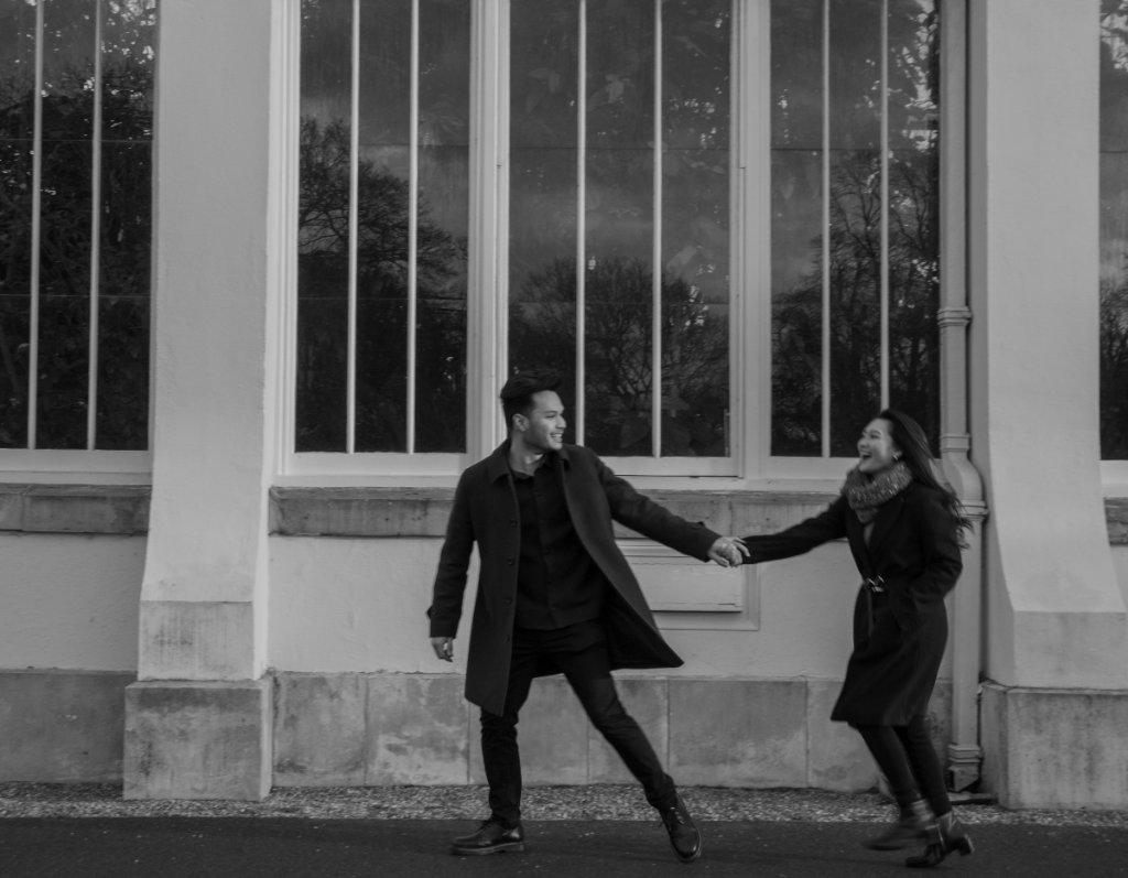 Couple holding hands black and white