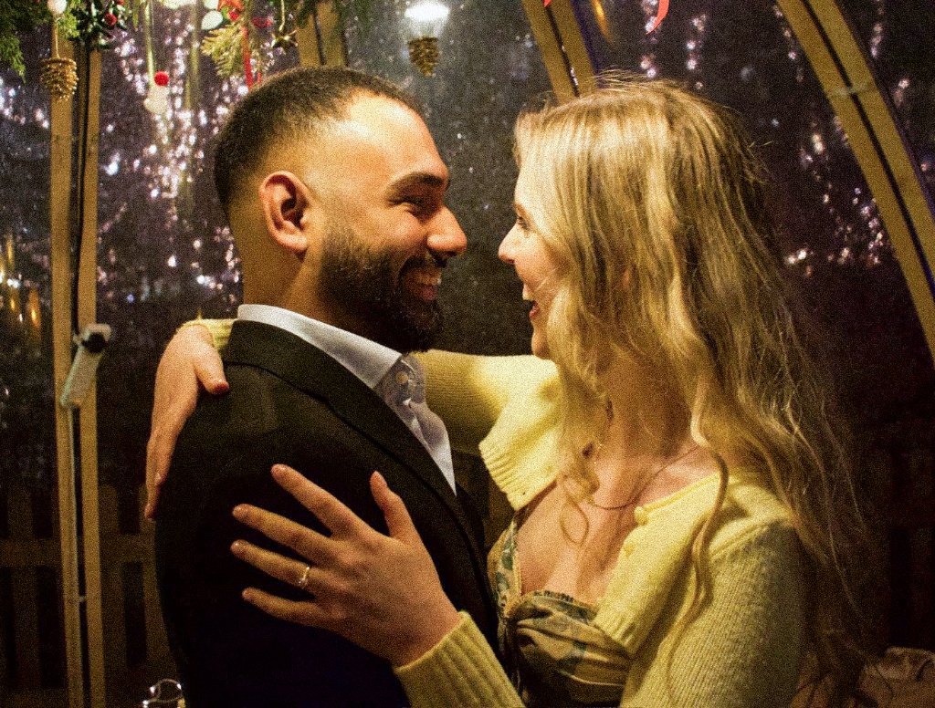 Couple smiling after proposal