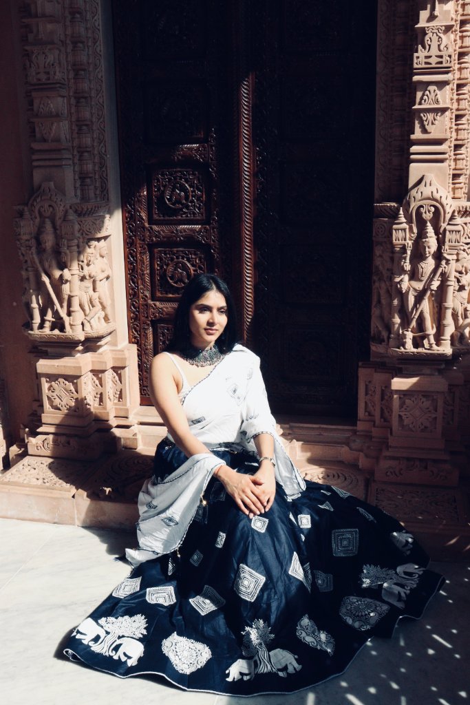 Fashion portrait with flowing dupatta at heritage site