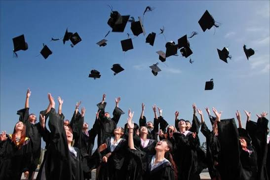 High school graduates celebrating