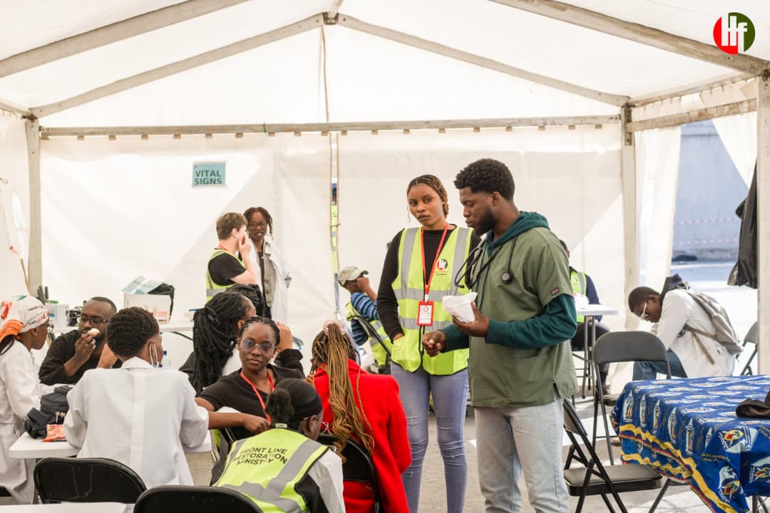 The medical outreach team inside a tent