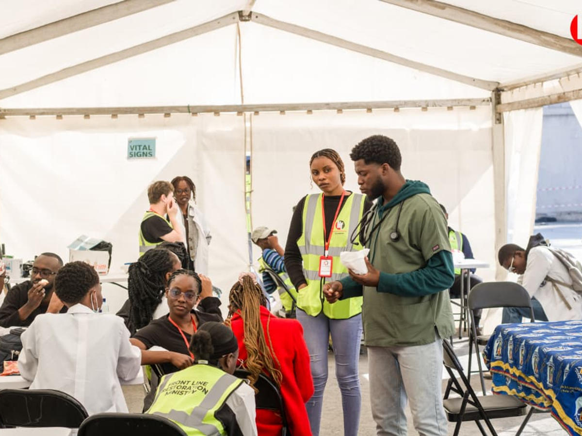 The medical outreach team inside a tent