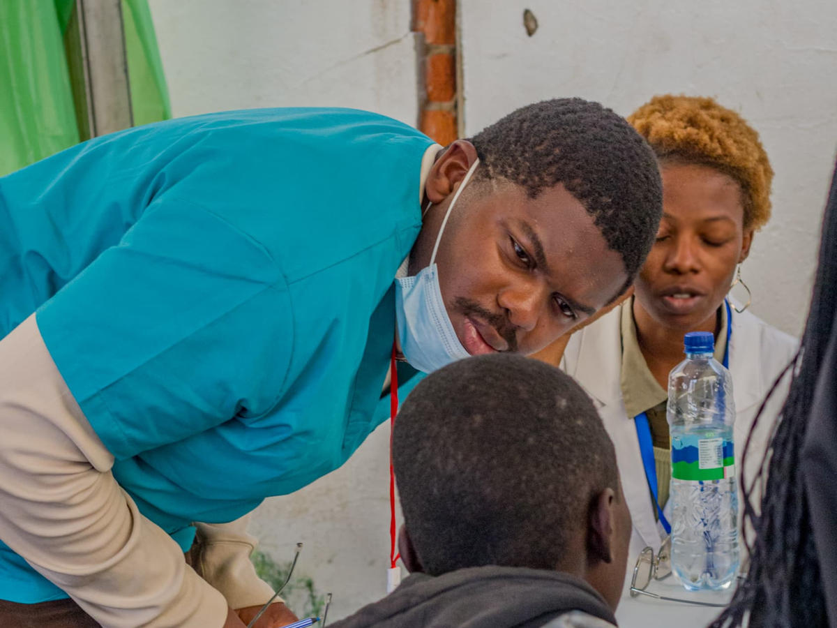 A volunteer in conversation with a participant