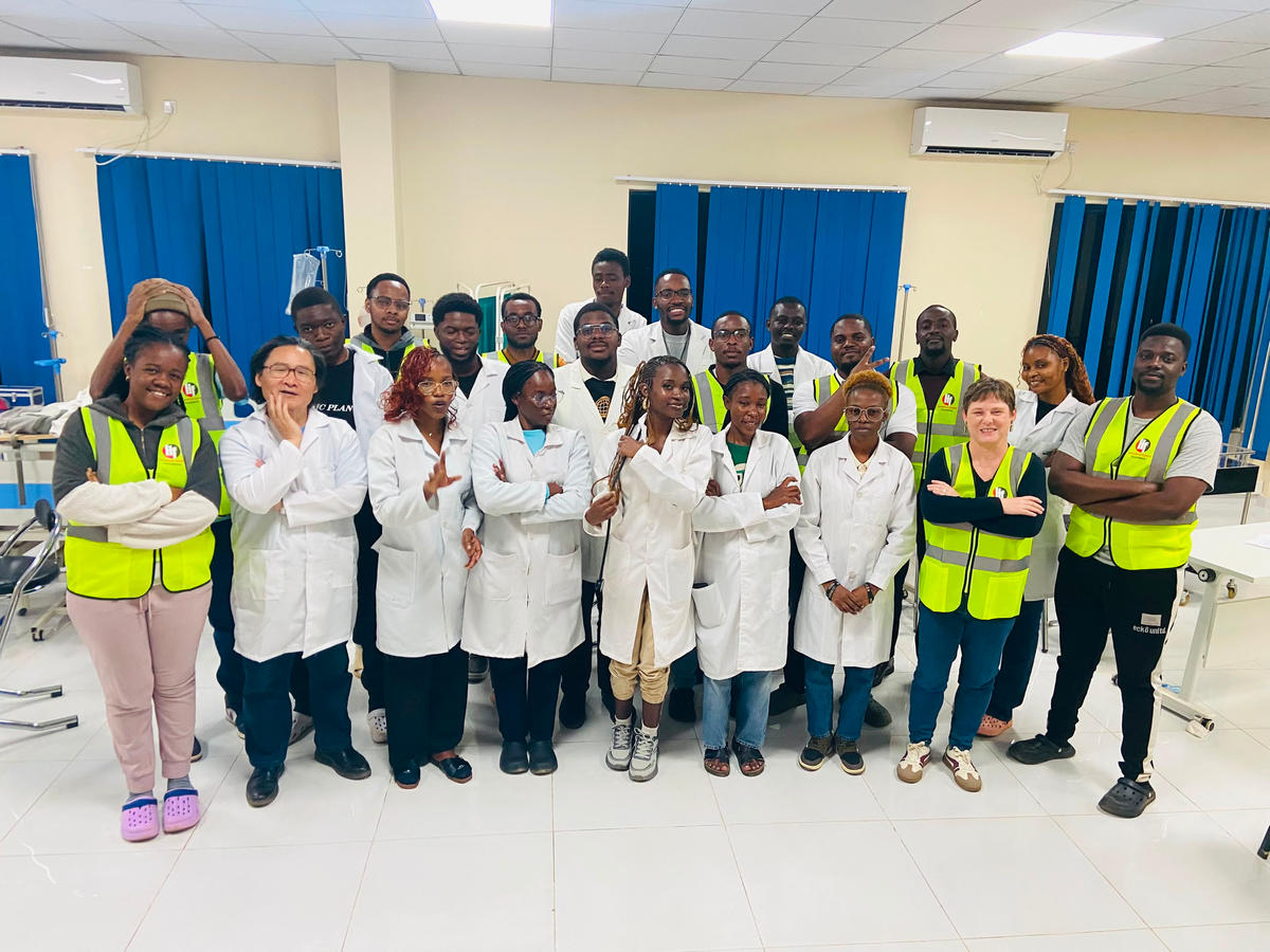 The training team posing together after preparation