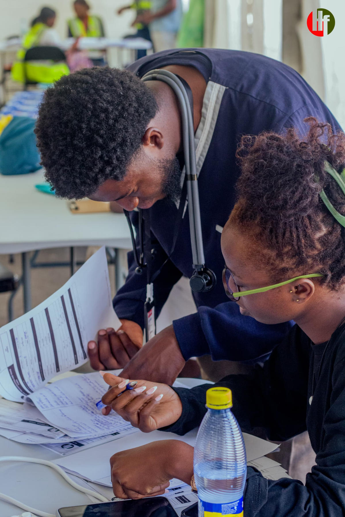 Health professionals reviewing records together