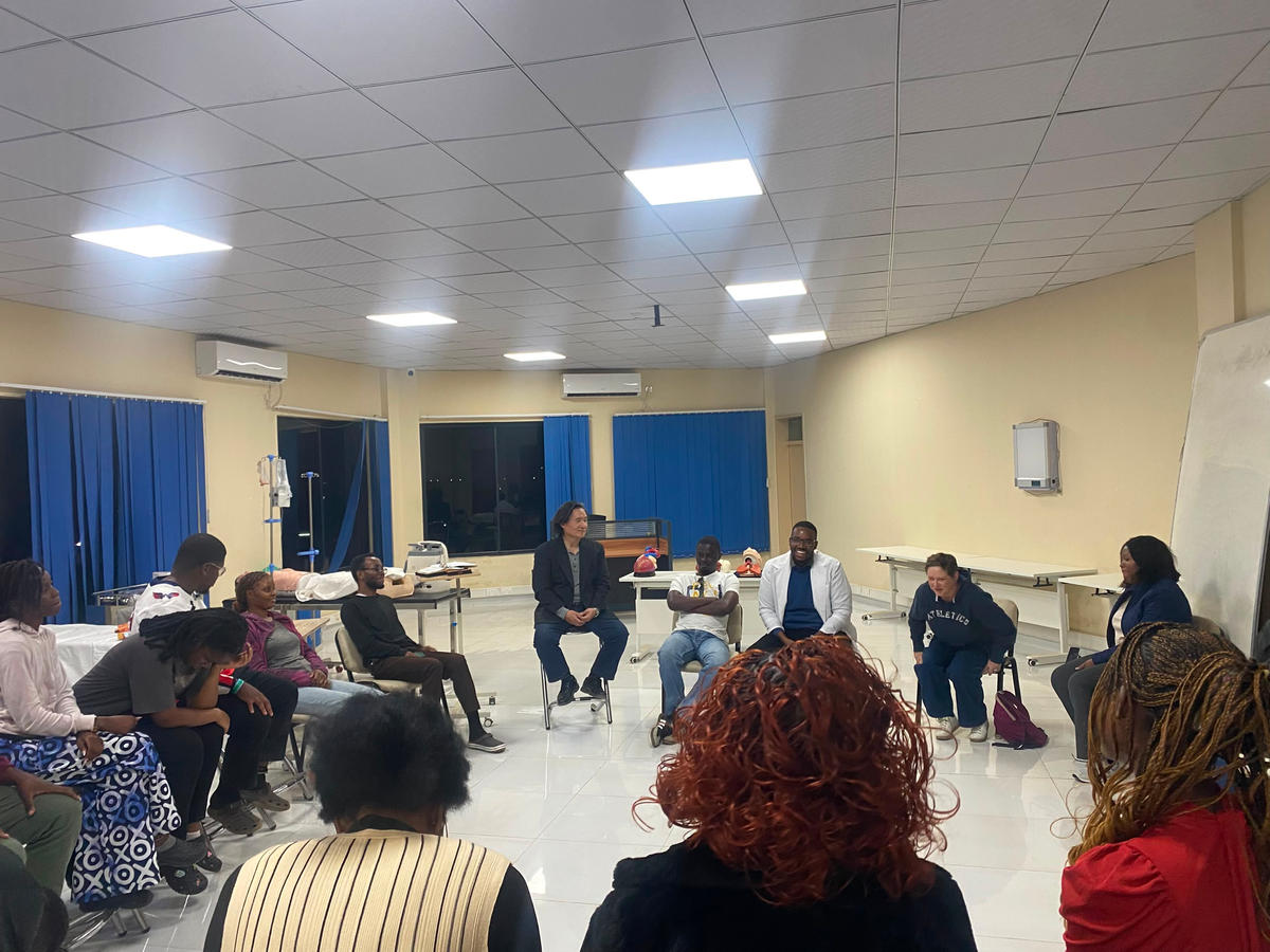Trainees seated in a circle for a group discussion