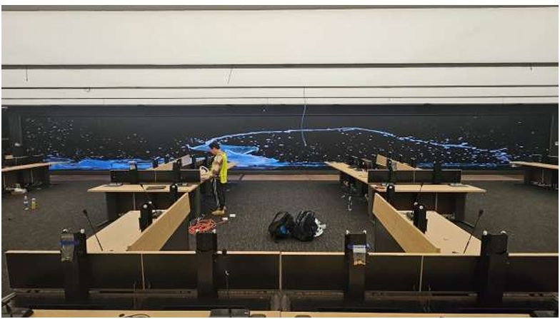 CenterPoint Energy control room build, the US's largest interactive video wall, Cyviz touch-panel controls, U-shaped operator workstations, and 24/7 emergency-operations readiness.