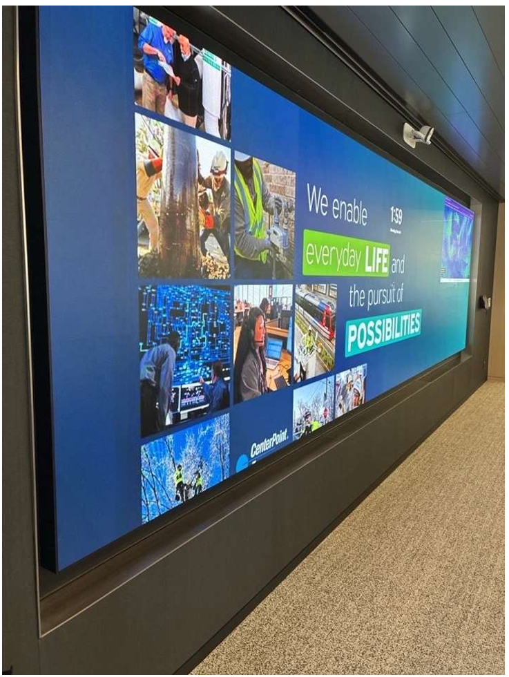 CenterPoint Energy control room build, the US's largest interactive video wall, Cyviz touch-panel controls, U-shaped operator workstations, and 24/7 emergency-operations readiness.