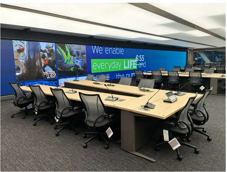 CenterPoint Energy control room build, the US's largest interactive video wall, Cyviz touch-panel controls, U-shaped operator workstations, and 24/7 emergency-operations readiness.
