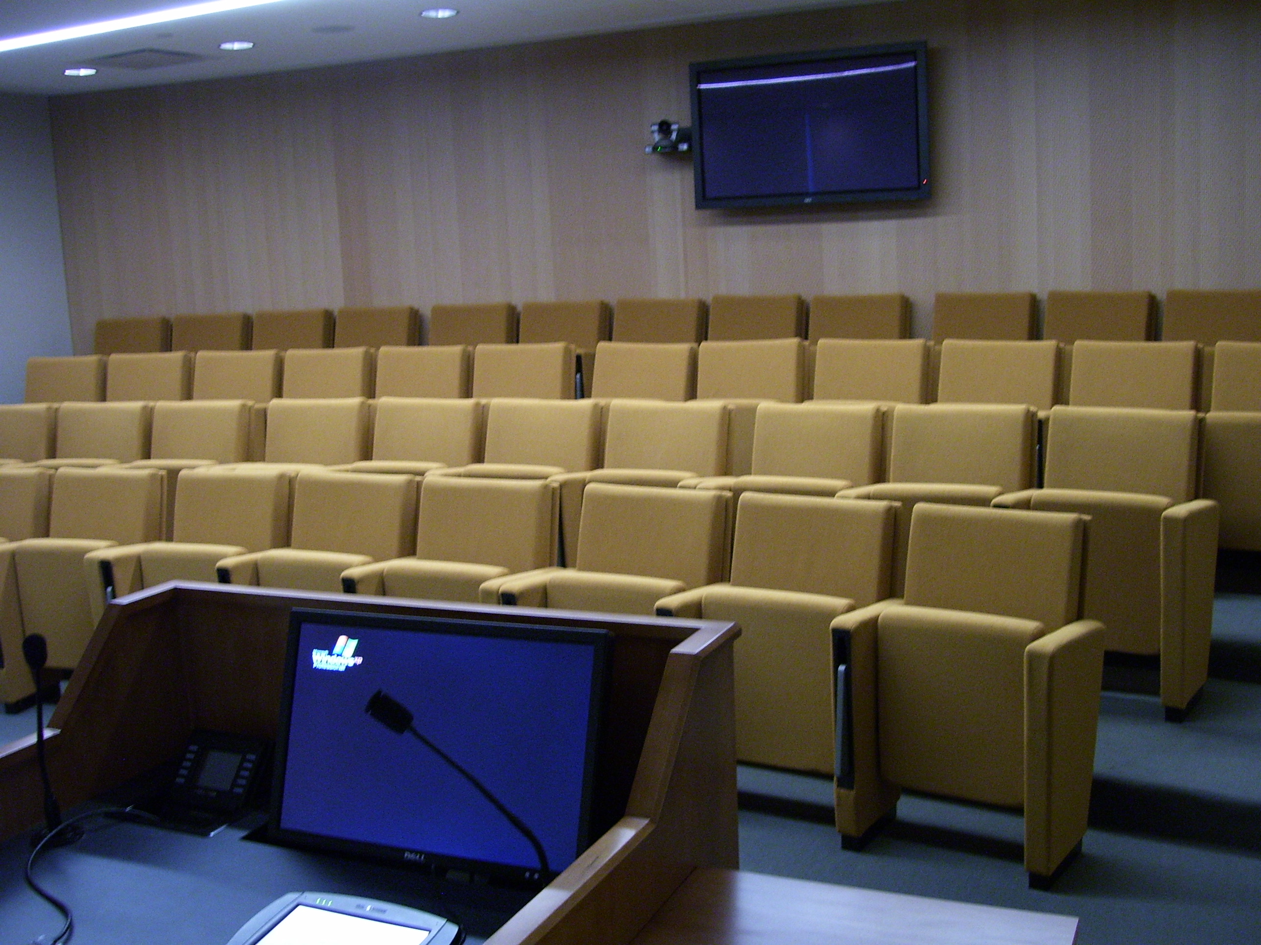 Invesco HQ integration proof, reception, executive corner offices with Atlanta skyline views, glass conference rooms, auditorium AV, video conferencing control room, codec farm server racks, and the executive workspace.