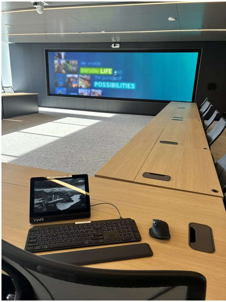 CenterPoint Energy control room build, the US's largest interactive video wall, Cyviz touch-panel controls, U-shaped operator workstations, and 24/7 emergency-operations readiness.