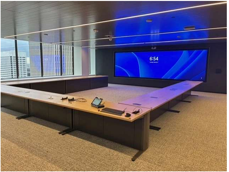 CenterPoint Energy control room build, the US's largest interactive video wall, Cyviz touch-panel controls, U-shaped operator workstations, and 24/7 emergency-operations readiness.