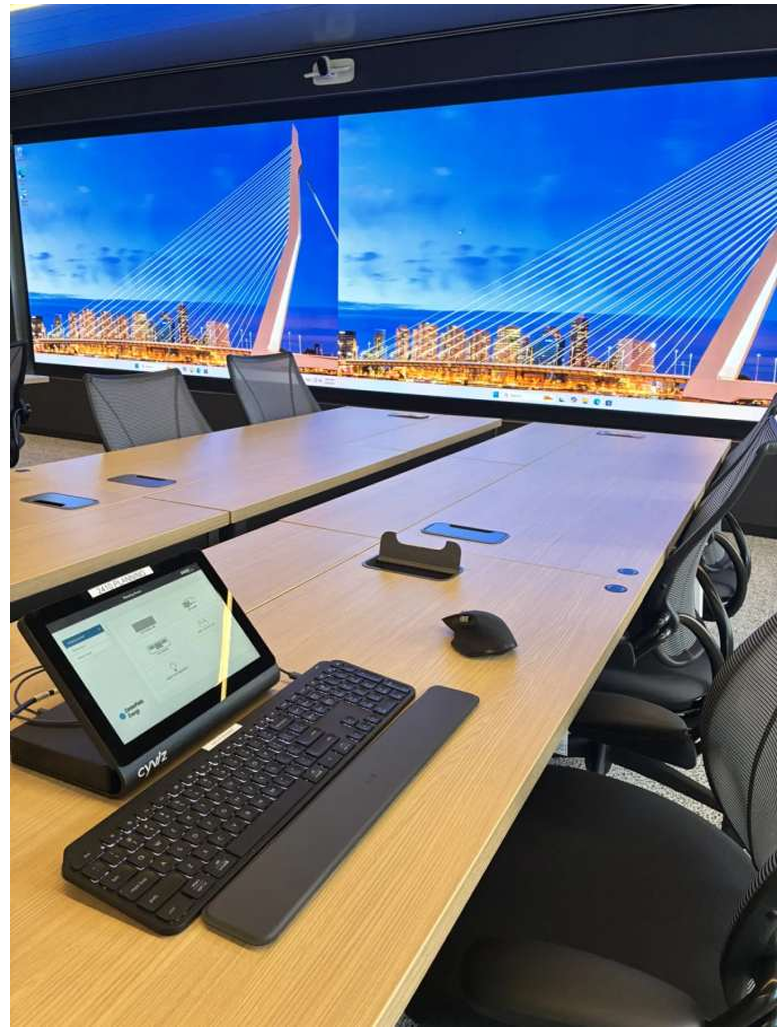 CenterPoint Energy control room build, the US's largest interactive video wall, Cyviz touch-panel controls, U-shaped operator workstations, and 24/7 emergency-operations readiness.