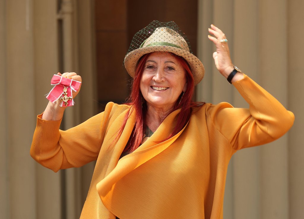 Lynne Franks collecting her OBE