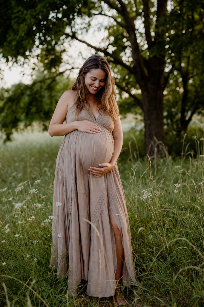 Pregnant woman in a field