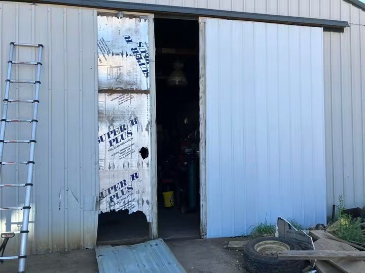 Damaged Bay Doors — Replaced & Repaired