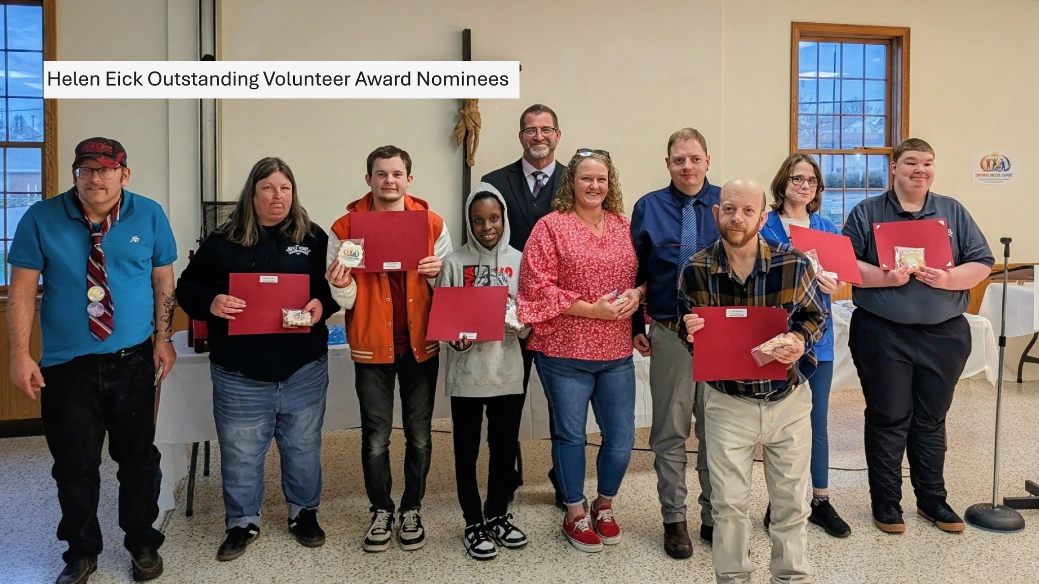 Volunteers holding certificates as Helen Eick Outstanding Volunteer Award nominees