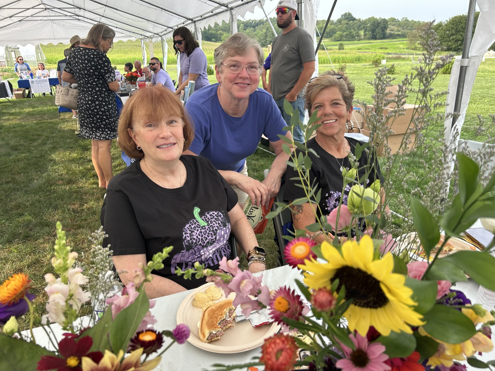 Community outreach event tent and team