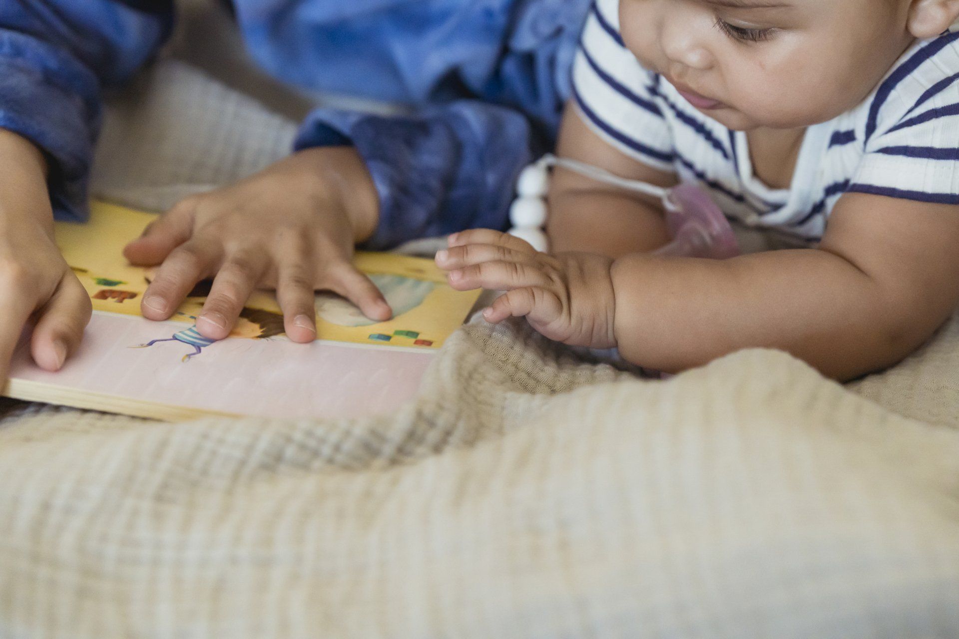 Young child doing a hands-on learning activity in Head Start