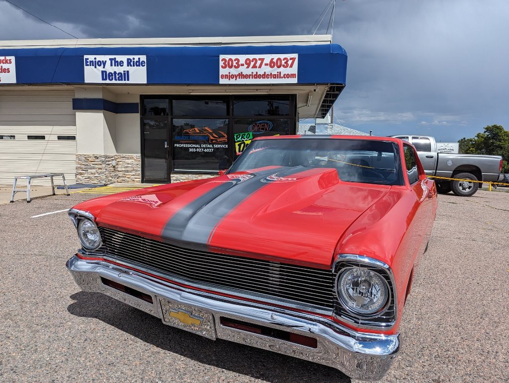 Red classic car outside Enjoy the Ride Detail