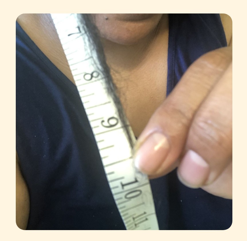 Laalita measuring hair growth after the 30-Day Hair Growth Challenge