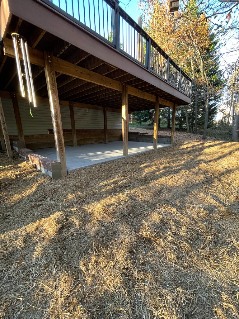 Under deck concrete patio