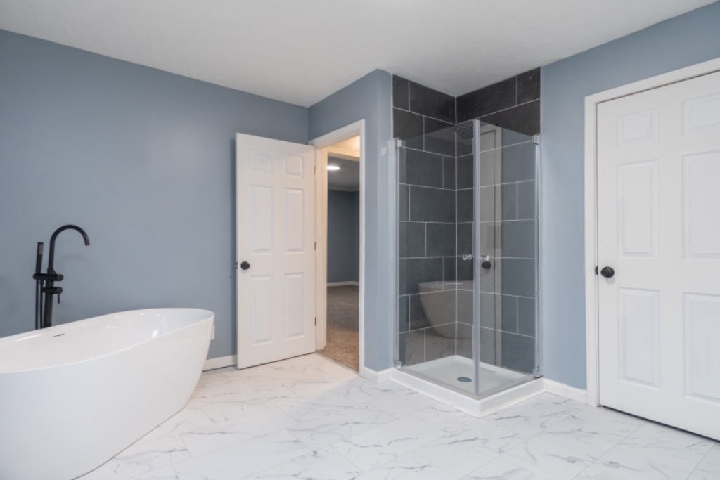 Freestanding Tub with Glass-Enclosed Walk-In Shower
