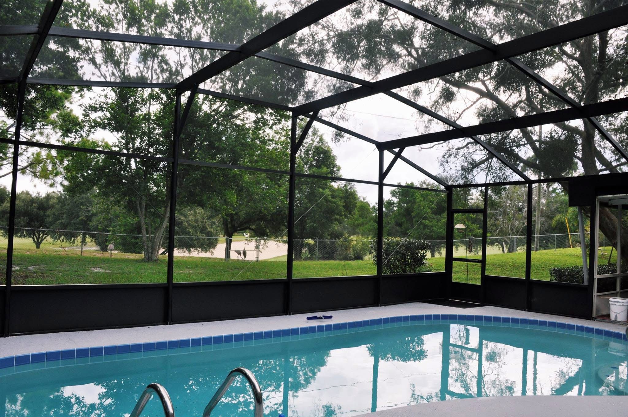 Pool enclosure screening — example for pool, patio, porch and lanai screen repair service in Silver Springs Shores East, FL