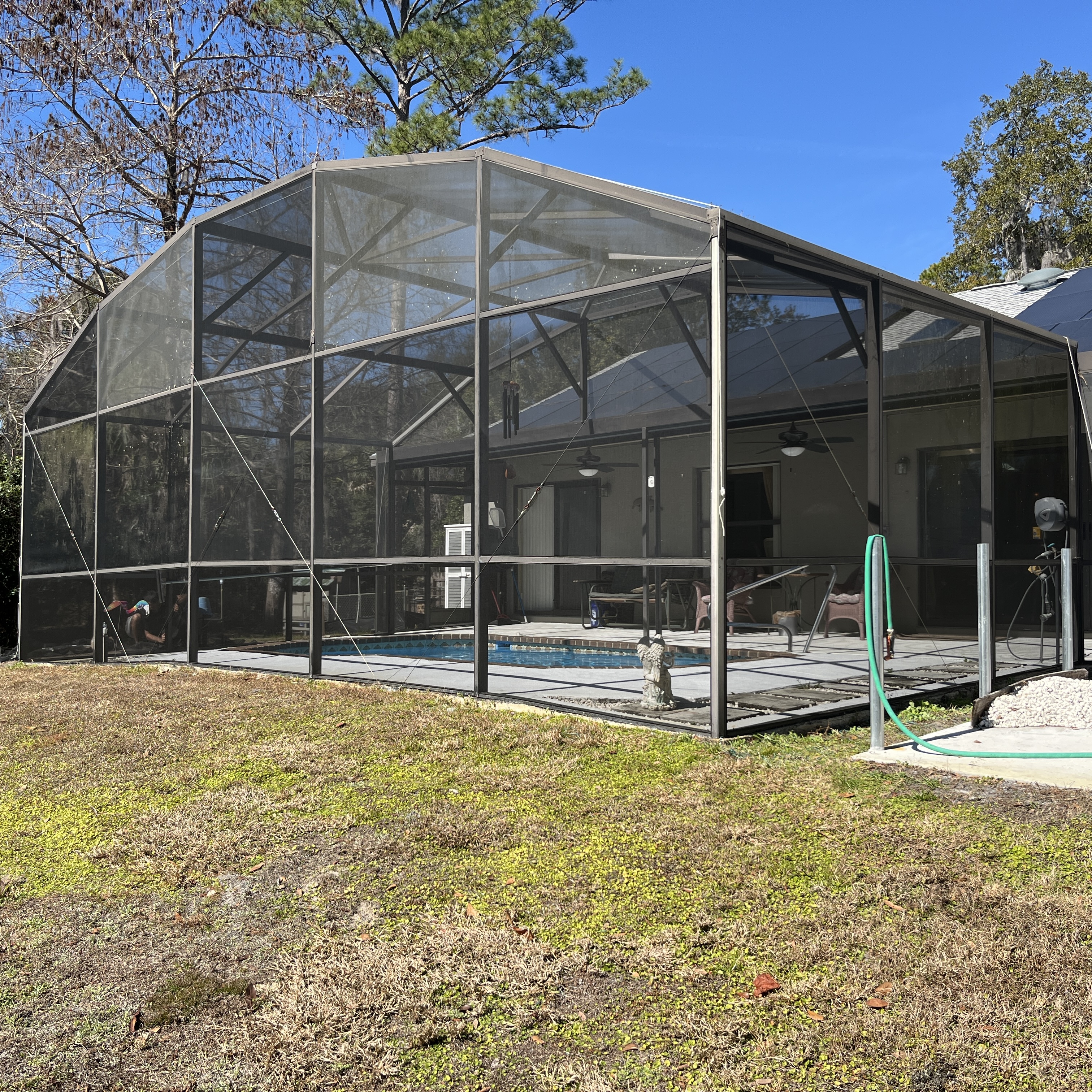 Pool enclosure screening — example for pool, patio, porch and lanai screen repair service in West DeLand, FL