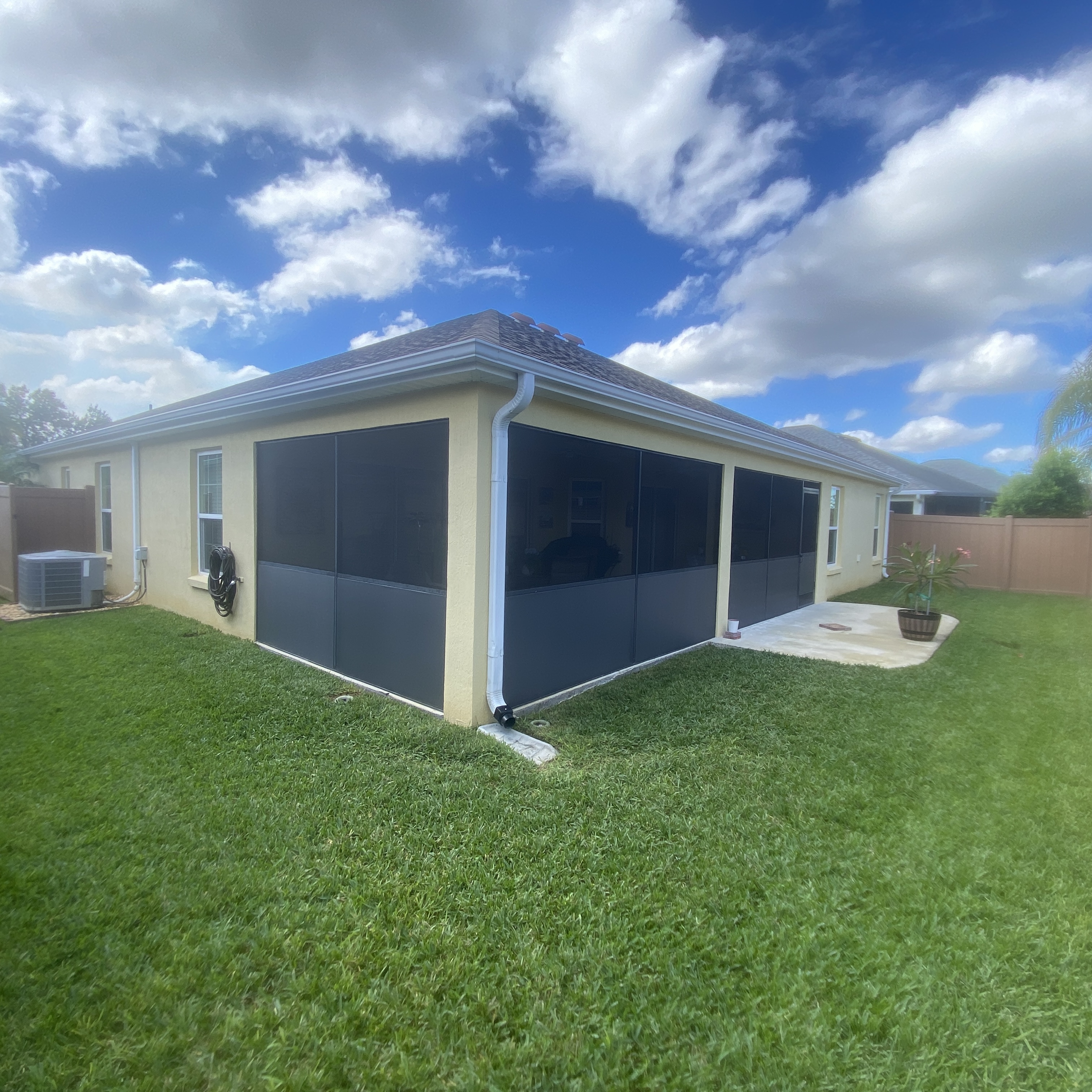Porch with privacy screening — example for pool, patio, porch and lanai screen repair service in Daytona Beach, FL