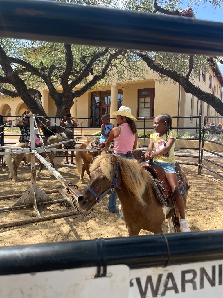 Kids riding horses