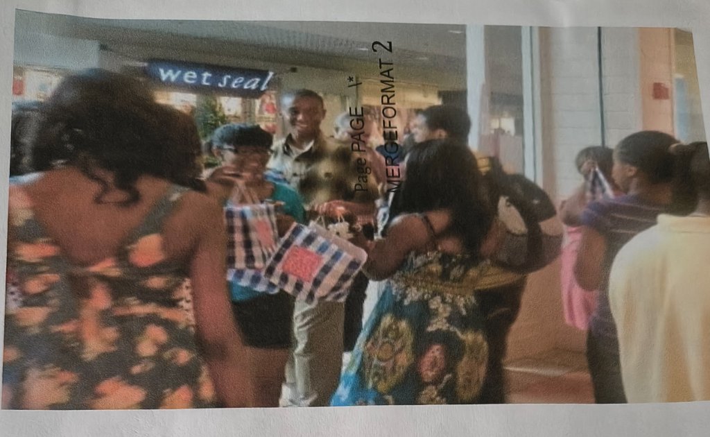 Graduates with Bath & Body Works Shopping Bags at the Mall — June 11, 2012