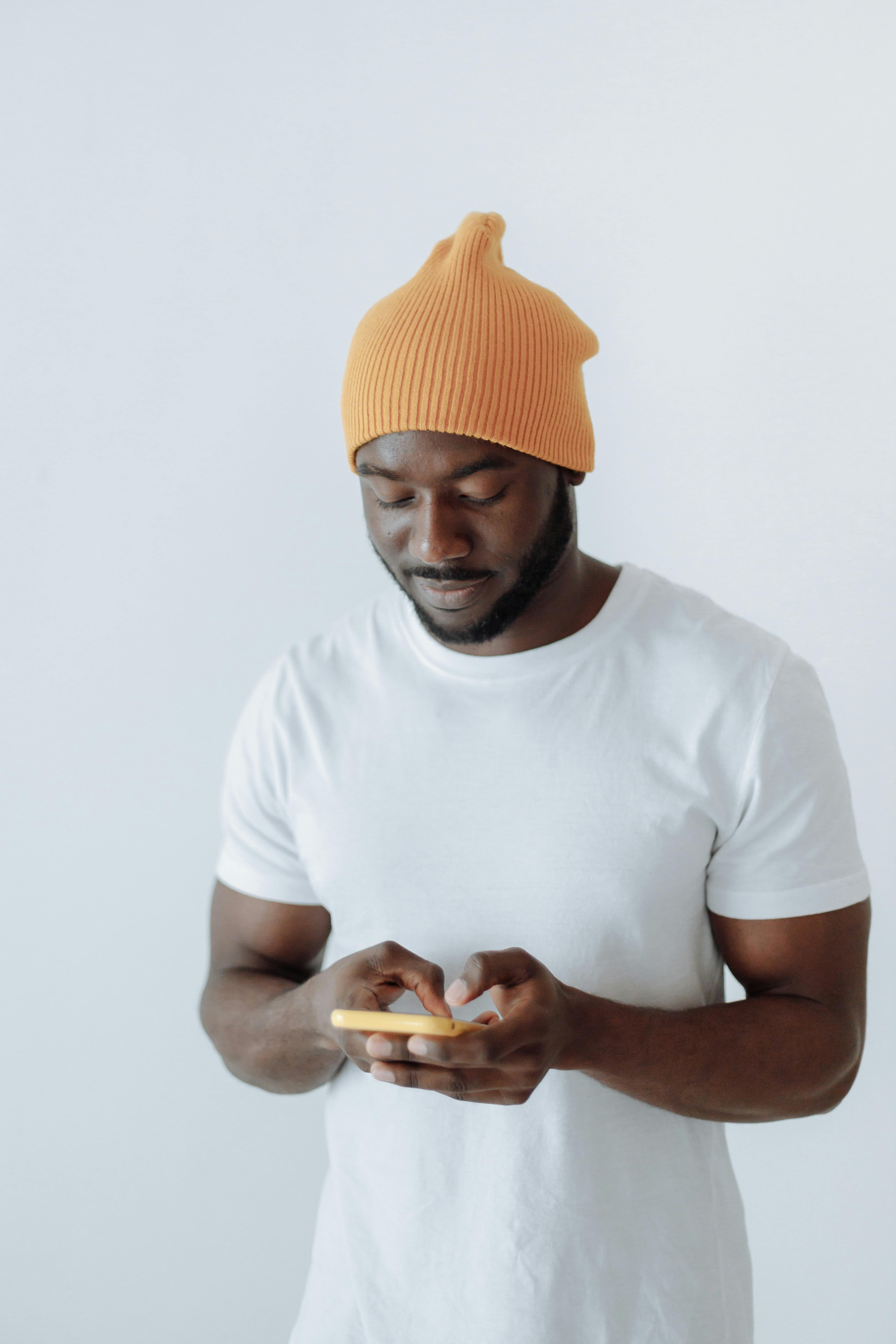 A person looking down at their phone