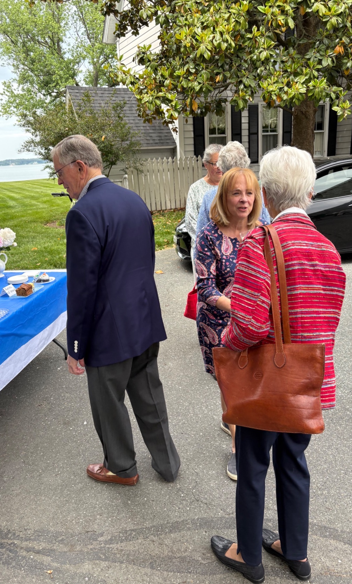 Carol Van Erven talking with a community member