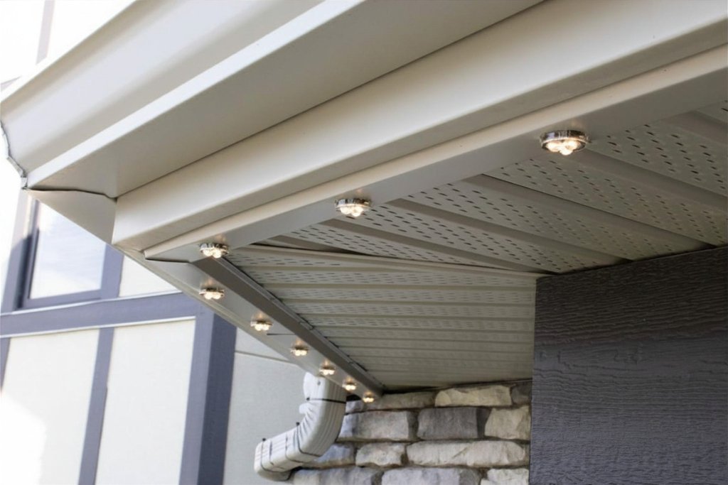 Gemstone Lights LED bulbs flush-mounted in soffit on custom home in Central Oregon — daytime profile