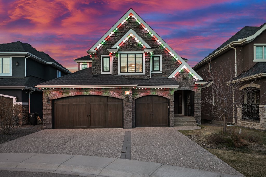 Home with vibrant holiday lighting at night