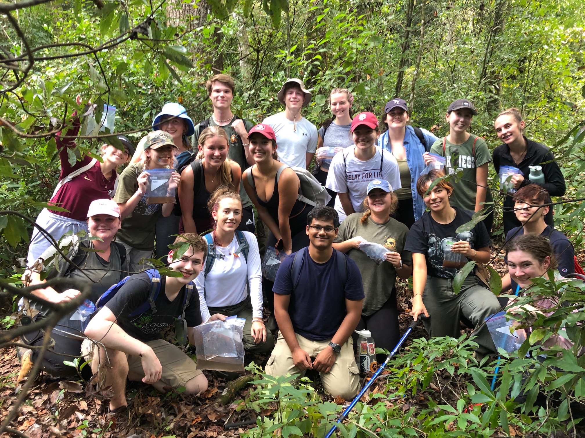 Field course group photo in the forest