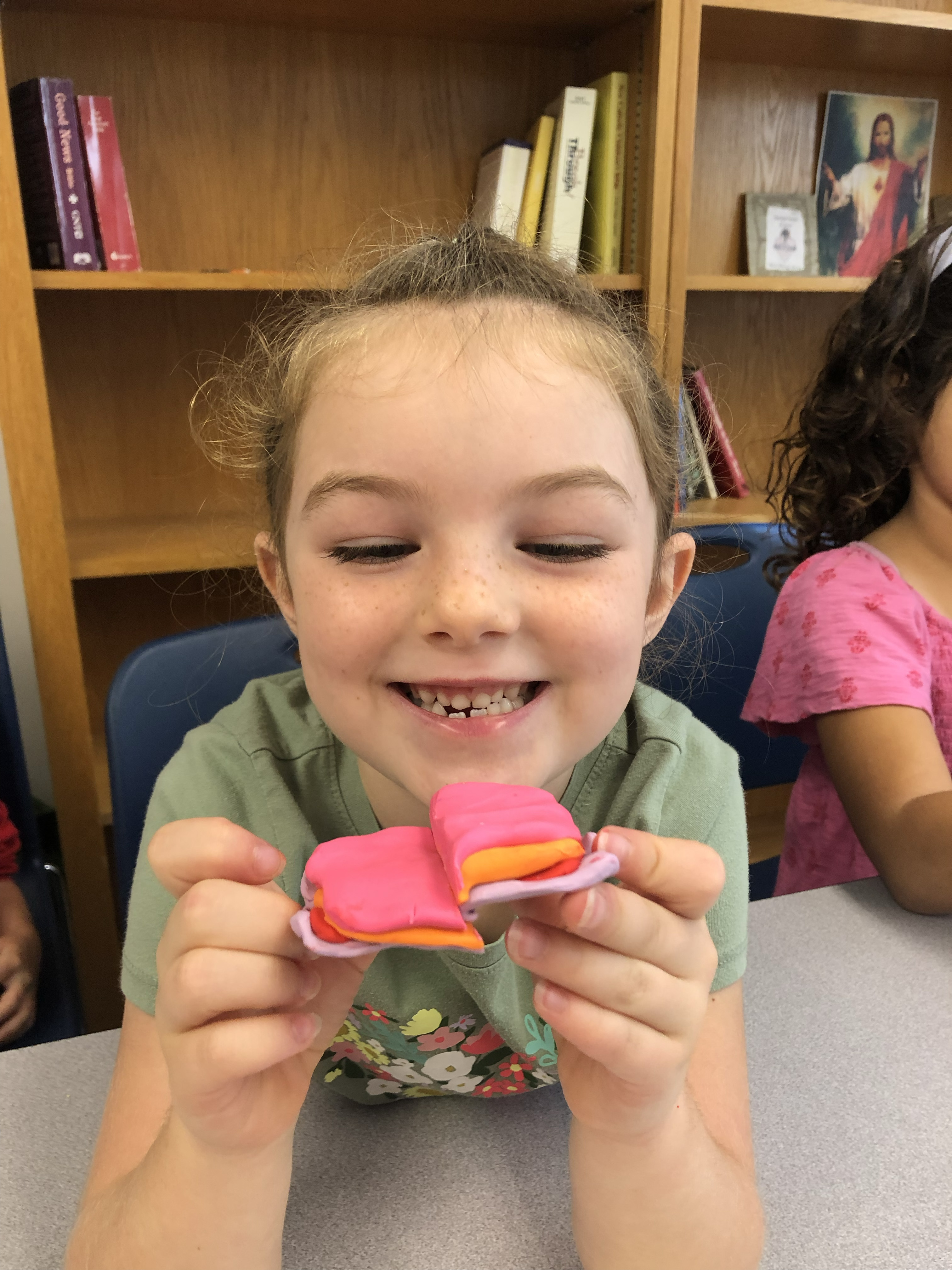 Outreach: A bright smile with a clay craft