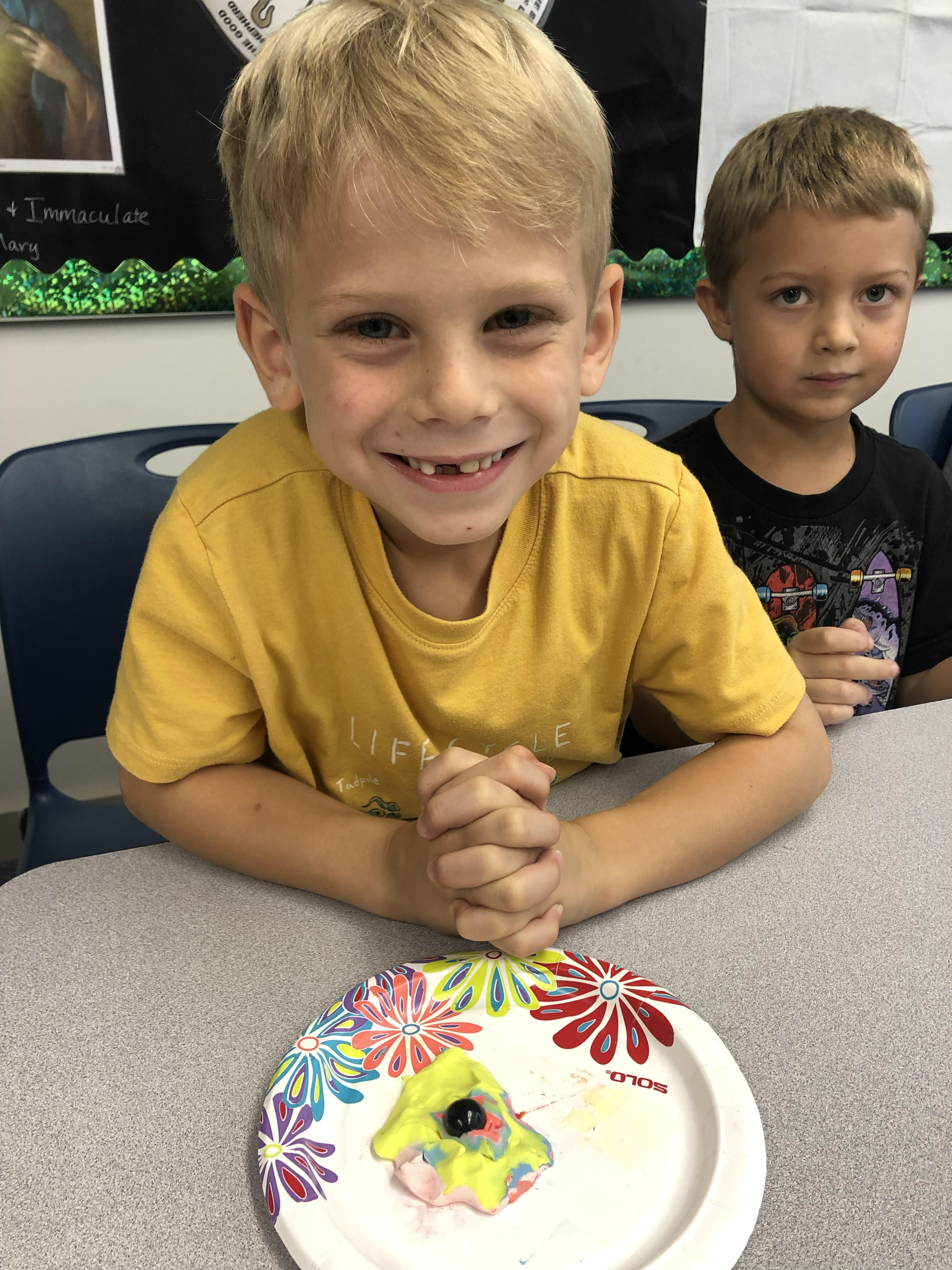 Outreach: Proud of a clay creation