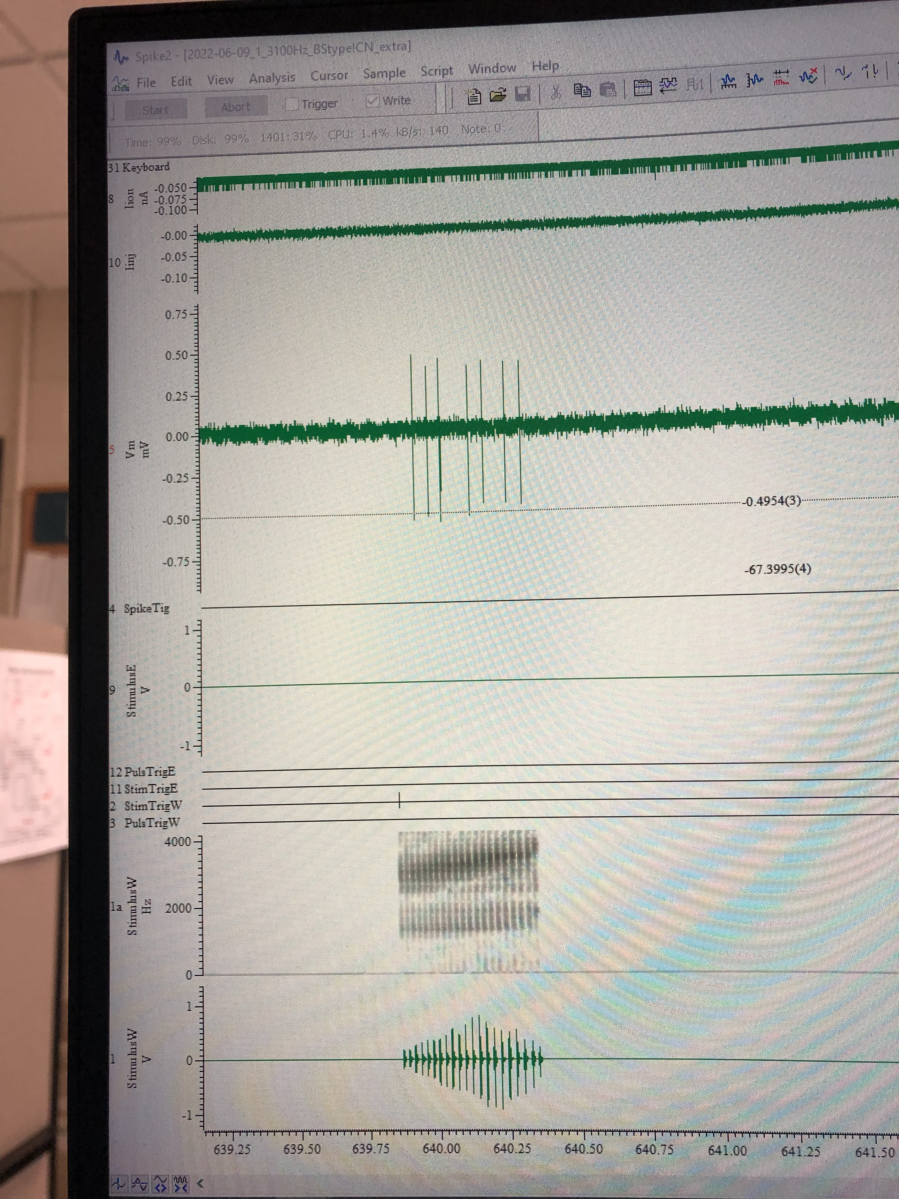 Electrophysiology recording — Spike2 multi-channel view with membrane potential and stimulus traces.