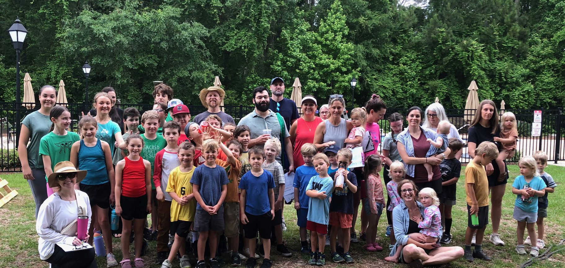 PHOTO: Homeschool Community Engagement — outreach activity in action, participants engaged with nature or specimens.