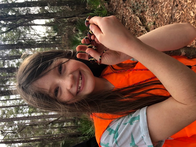 Chiara, outreach with a scarlet kingsnake