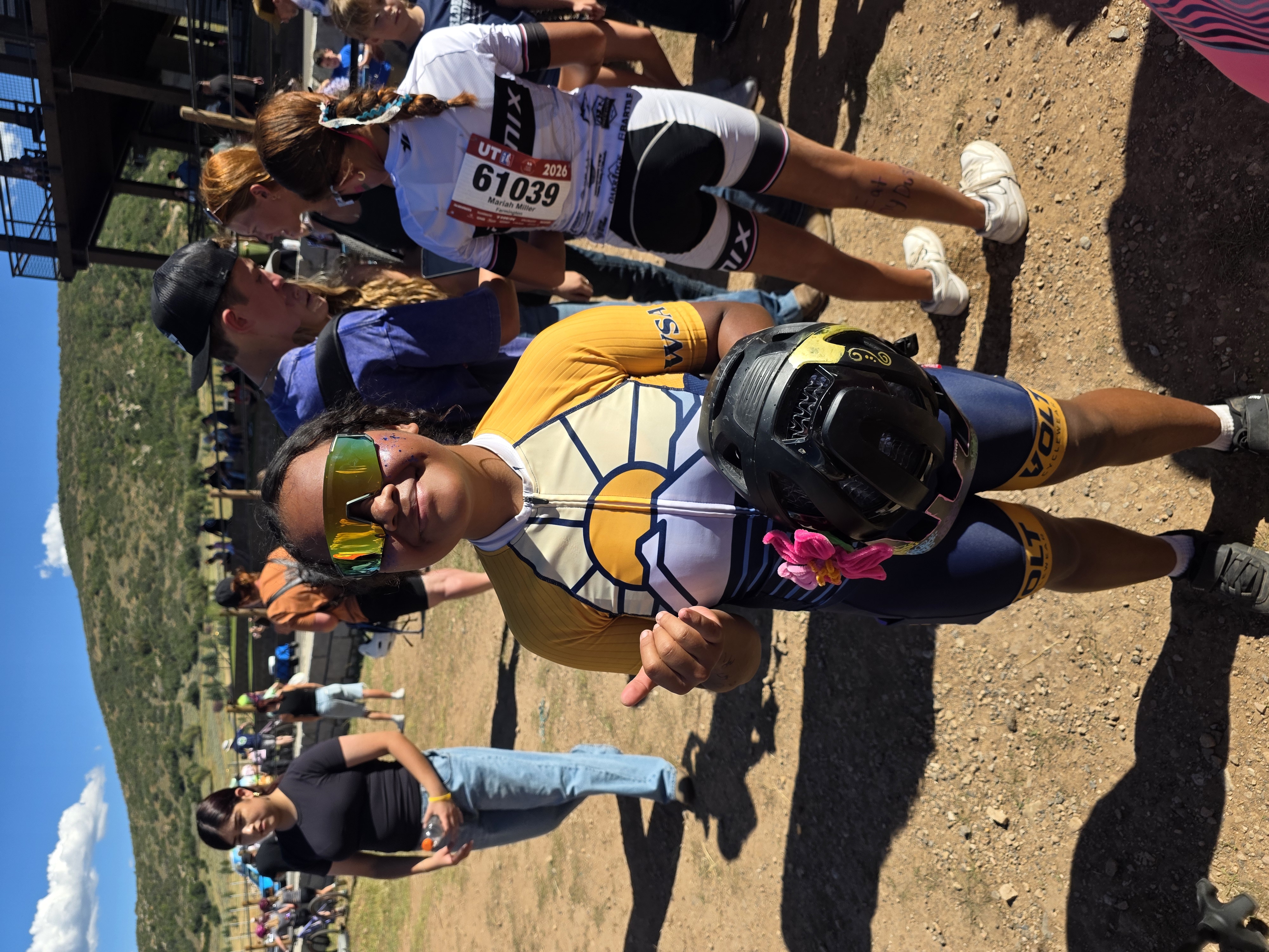 Rider with mirrored sunglasses giving a thumbs up