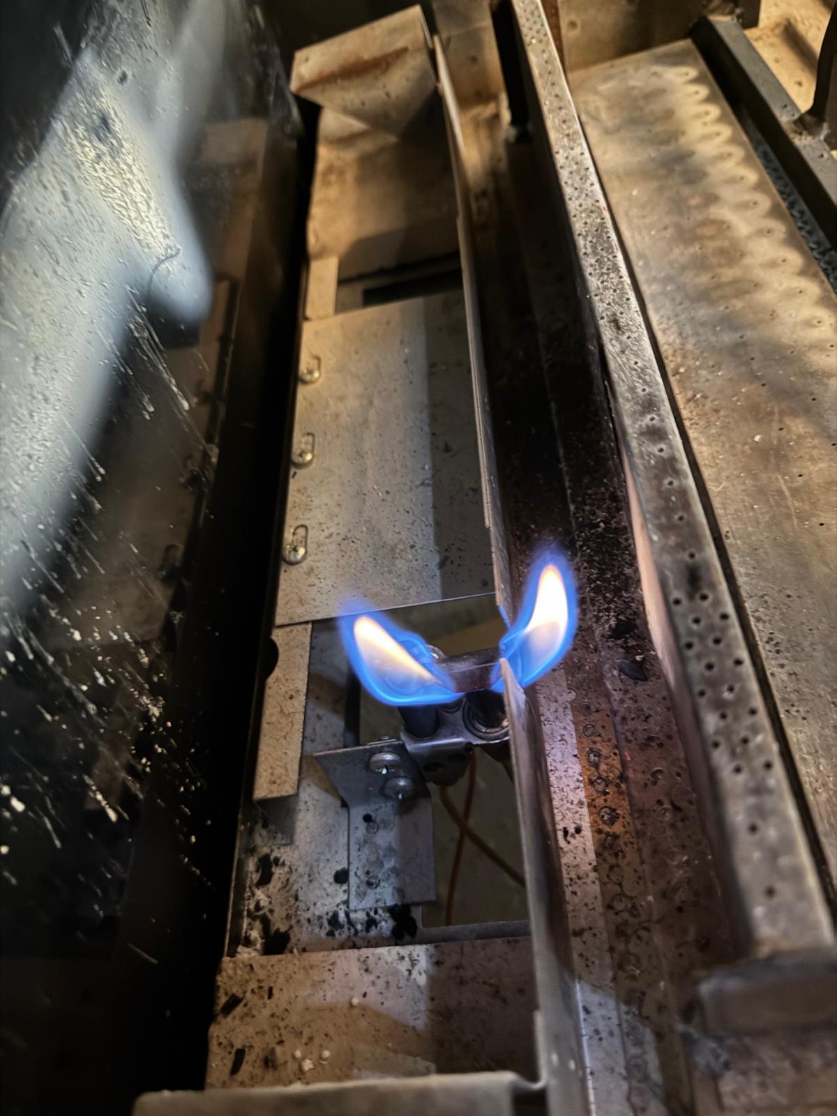 Real fireplace technician working in a Great Falls Virginia home