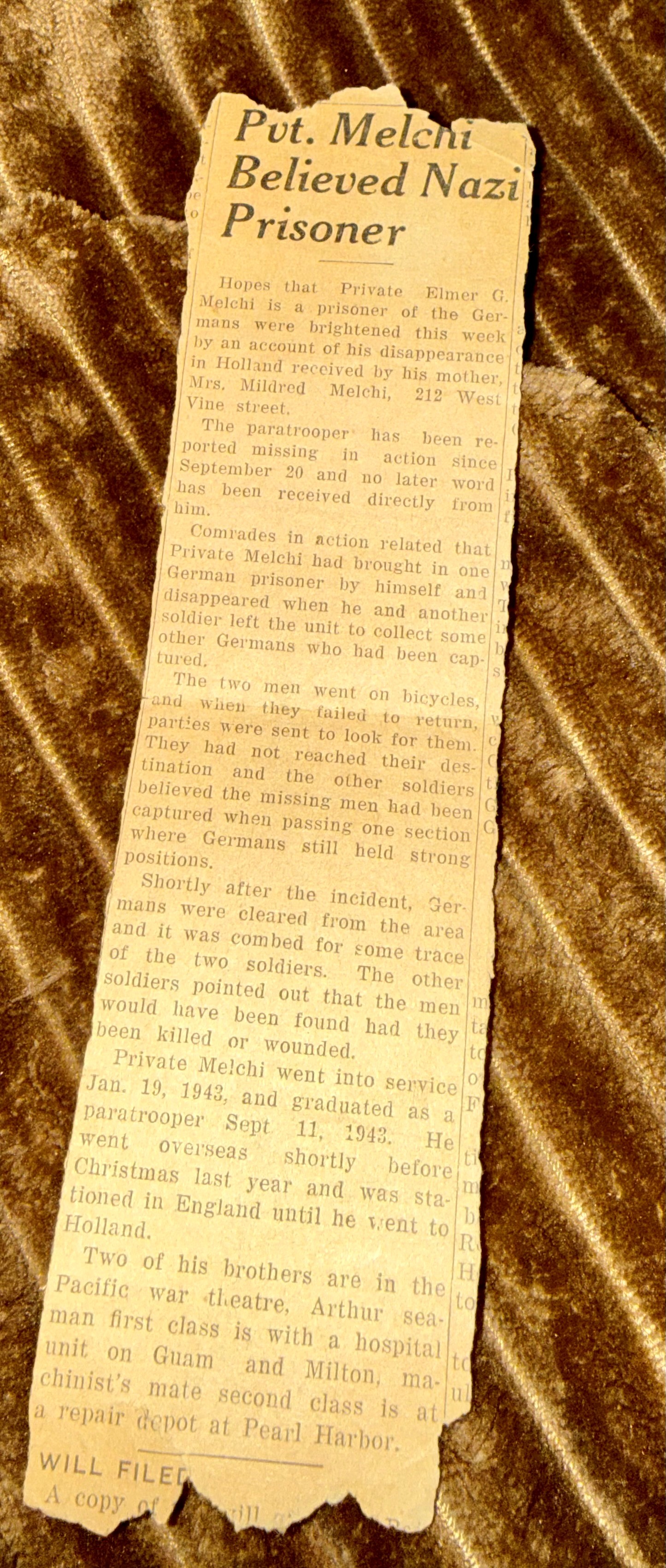 Champaign IL newspaper clipping — Pvt. Melchi believed Nazi prisoner