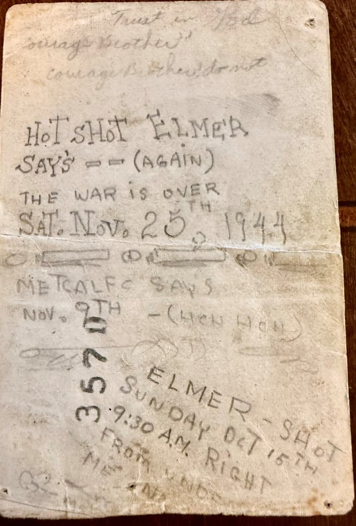 Handwritten note on the back of the photo Elmer carried